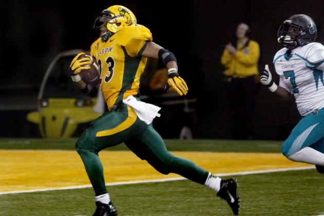 North Dakota State's John Crockett scores against Coastal Carolina during an FCS quarterfinal NCAA college football game Saturday, Dec. 13, 2014, in Fargo, N.D.  (AP Photo/Bruce Crummy)