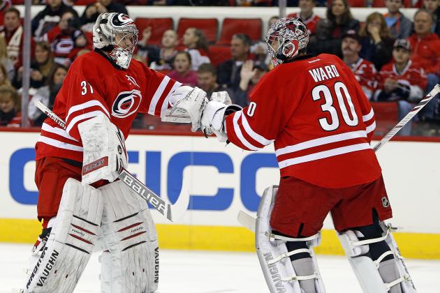 Carolina Hurricanes goalie Anton Khudobin (31) replaces goalie Cam Ward (30) after the New York Islanders score their third goal during the first period of an NHL hockey game in Raleigh, N.C., Tuesday, March 25, 2014. (AP Photo/Karl B DeBlaker)