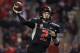 Fresno State's Brian Burrell tosses a pass against Hawaii in the second half of an NCAA college football game in Fresno, Calif., Saturday, Nov. 29, 2014. (AP Photo/Gary Kazanjian)