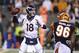 Denver Broncos quarterback Peyton Manning passes against the Cincinnati Bengals during the first half of an NFL football game Monday, Dec. 22, 2014, in Cincinnati. (AP Photo/Michael Conroy)