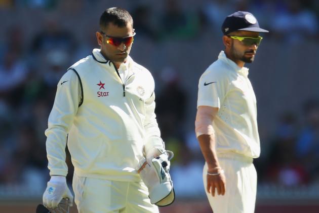 MELBOURNE, AUSTRALIA - DECEMBER 26:  MS Dhoni and Virat Kohli of India look on in the field during day one of the Third Test match between Australia and India at Melbourne Cricket Ground on December 26, 2014 in Melbourne, Australia.  (Photo by Scott Barbour/Getty Images)