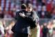 SANTA CLARA, CA - DECEMBER 28: Head coach Jim Harbaugh of the San Francisco 49ers hugs 49ers CEO Jed York before their game against the Arizona Cardinals at Levi's Stadium on December 28, 2014 in Santa Clara, California. (Photo by Ezra Shaw/Getty Images)