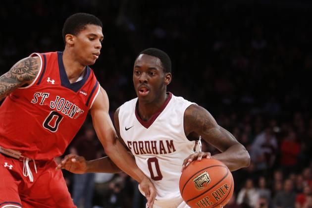 Fordham's Antwoine Anderson (0) drives against St. John's Jamal Branch (0) during the first half of an NCAA college basketball game Sunday, Dec. 14, 2014, in New York.  St. John's beat Fordham 74-53. (AP Photo/Jason DeCrow)