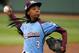 FILE - In this Aug. 15, 2014, file photo, Pennsylvania's Mo'ne Davis delivers in the fifth inning against Tennessee during a baseball game in United States pool play at the Little League World Series tournament in South Williamsport, Pa. Davis, who became an instant celebrity in August when she became the first girl to win a Little League World Series game, is The Associated Press 2014 Female Athlete of the Year. (AP Photo/Gene J. Puskar, File)