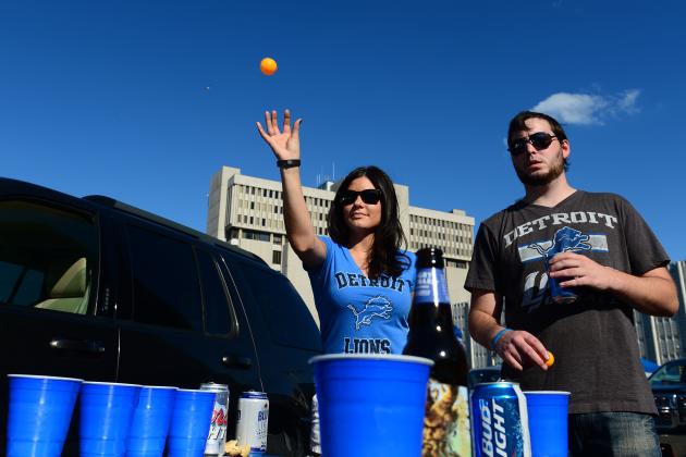 Sep 8, 2014; Detroit, MI, USA; Detroit Lion fans Kourtney Kotenko (left) and Peter Porrado play beer pong prior to the game against the New York Giants at Ford Field. Mandatory Credit: Andrew Weber-USA TODAY Sports