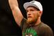 BOSTON, MA - AUGUST 17: Conor McGregor celebrates following his win against Max Holloway in their featherweight bout at TD Garden on August 17, 2013 in Boston, Massachusetts. (Photo by Jared Wickerham/Getty Images)