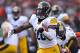 CINCINNATI, OH - DECEMBER 7: Le'Veon Bell #26 of the Pittsburgh Steelers runs the ball in for a touchdown during the fourth quarter of the game against the Cincinnati Bengals at Paul Brown Stadium on December 7, 2014 in Cincinnati, Ohio. Pittsburgh defeated Cincinnati 42-21. (Photo by Andy Lyons/Getty Images)