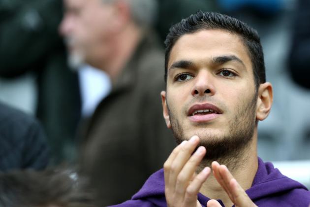 Hull City's Hatem Ben Arfa looks at the match while sitting with the Newcastle Supporters during the English Premier League soccer match against Newcastle United at St James' Park, Newcastle, England, Saturday, Sept. 20, 2014. (AP Photo/Scott Heppell)