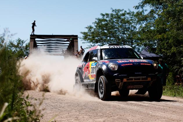 VILLA CARLOS PAZ, ARGENTINA - JANUARY 04: #301 Nasser Al Attiyah of Qatar and Mathieu Baumel of France for the ALL4 Racing Mini Qatar Rally Team compete during day 1 of the Dakar Rallly on January 4, 2015 between Buenos Aires and Villa Carlos Paz, Argentina. (Photo by Dean Mouhtaropoulos/Getty Images)