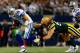 ARLINGTON, TX - DECEMBER 15: Quarterback Tony Romo #9 of the Dallas Cowboys is tackled by outside linebacker Clay Matthews #52 of the Green Bay Packers during a game at AT&T Stadium on December 15, 2013 in Arlington, Texas. (Photo by Tom Pennington/Getty Images)