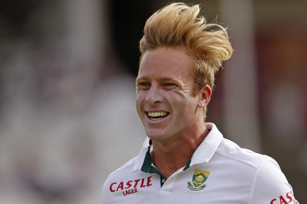 South Africa's Simon Harmer jumps up after taking the wicket of West Indies Marlon Samuels, during the third cricket test match in Cape Town, South Africa, Monday, Jan. 5, 2015. (AP Photo/Schalk van Zuydam)