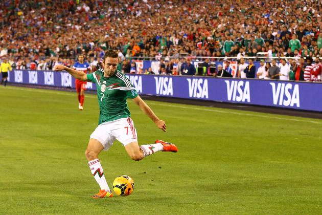 Apr 2, 2014; Glendale, AZ, USA; Mexico defender Miguel Layun (7) against USA during a friendly match at University of Phoenix Stadium. The game ended in a 2-2 tie. Mandatory Credit: Mark J. Rebilas-USA TODAY Sports