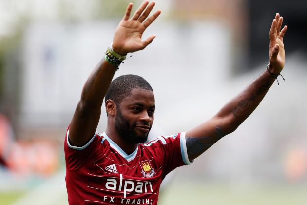 LONDON, ENGLAND - AUGUST 30: Alex Song of West Ham United acknowledges the fans as he joins the club on loan prior to the Barclays Premier League match between West Ham United and Southampton at Boleyn Ground on August 30, 2014 in London, England. (Photo by Steve Bardens/Getty Images)