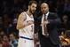 New York Knicks head coach Derek Fisher, right, talks to guard Jose Calderon (3), of Spain, during the second half of an NBA basketball game against the Detroit Pistons, Friday, Jan. 2, 2015, in New York. The Pistons won the game 97-81. (AP Photo/Frank Franklin II)
