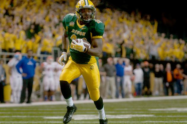 North Dakota State's John Crockett is alone during a long run early in the second half for a touchdown against Sam Houston State in the semifinals of the NCAA Football Championship Subdivision, Friday, Dec. 19, 2014, in Fargo, N.D. (AP Photo/Bruce Crummy)