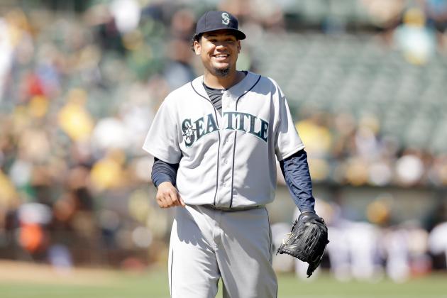 OAKLAND, CA - SEPTEMBER 03: Felix Hernandez #34 of the Seattle Mariners smiles as he walks off the field after the eighth inning of their game against the Oakland Athletics at O.co Coliseum on September 3, 2014 in Oakland, California. (Photo by Ezra Shaw/Getty Images)