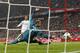 Real's Cristiano Ronaldo, left, scores his side's 3rd goal past Bayern goalkeeper Manuel Neuer during the Champions League semifinal second leg soccer match between Bayern Munich and Real Madrid at the Allianz Arena in Munich, southern Germany, Tuesday, April 29, 2014. (AP Photo/Matthias Schrader)