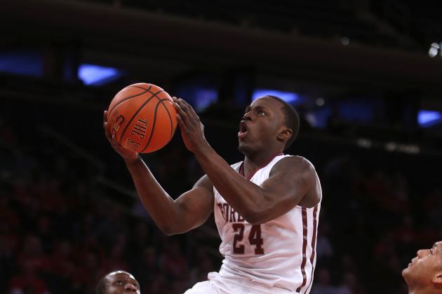 Fordham's Bryan Smith (24) goes to the basket against St. John's during the first half of an NCAA college basketball game Sunday, Dec. 14, 2014, in New York. St. John's beat Fordham 74-53. (AP Photo/Jason DeCrow)