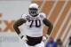 Texas A&M offensive lineman Cedric Ogbuehi (70) plays against West Virginia in the second half of the Liberty Bowl NCAA college football game Monday, Dec. 29, 2014, in Memphis, Tenn. Texas A&M won 45-37. (AP Photo/Mark Humphrey)