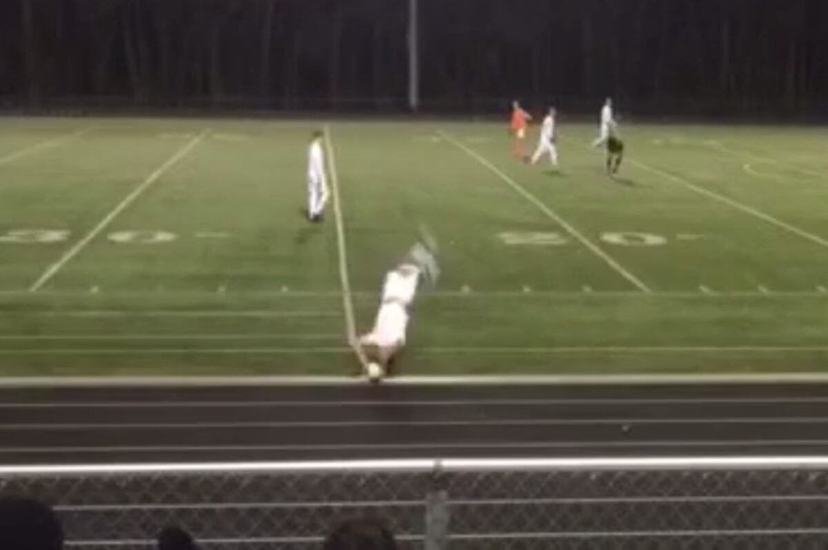 Soccer Player Scores Incredible Goal off FrontFlip Throwin from Long