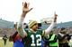 GREEN BAY, WI - JANUARY 11: Aaron Rodgers #12 of the Green Bay Packers celebrates after defeating the Dallas Cowboys 26-21 during the 2015 NFC Divisional Playoff game at Lambeau Field on January 11, 2015 in Green Bay, Wisconsin. (Photo by Al Bello/Getty Images)