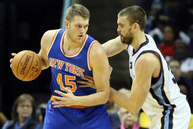 Jan 5, 2015; Memphis, TN, USA; New York Knicks center Cole Aldrich (45) drives against Memphis Grizzlies center Marc Gasol (33) during the first half at FedExForum. Mandatory Credit: Nelson Chenault-USA TODAY Sports