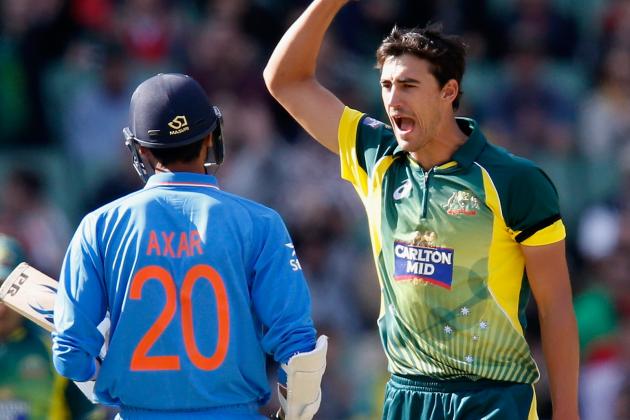 MELBOURNE, AUSTRALIA - JANUARY 18:  Mitchell Starc of Australia celebrates the wicket of Axar Patel of India during the One Day International match between Australia and India at Melbourne Cricket Ground on January 18, 2015 in Melbourne, Australia.  (Photo by Darrian Traynor/Getty Images)