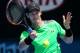 Andy Murray of Britain makes a forehand return to Yuki Bhambri of India during their first round match at the Australian Open tennis championship in Melbourne, Australia, Monday, Jan. 19, 2015. (AP Photo/Rob Griffith)