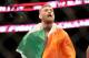 Conor McGregor, of Ireland, celebrates a win against Dennis Siver, of Germany, after their featherweight fight at UFC Fight Night, Sunday, Jan. 18, 2015 in Boston. McGregor won via 2nd round TKO. (AP Photo/Gregory Payan)