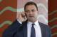 Agent Drew Rosenhaus talks on the phone outside baseball's winter meetings in Lake Buena Vista, Fla., Thursday, Dec. 12, 2013.(AP Photo/Phelan M. Ebenhack)