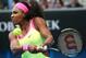 Serena Williams of the U.S. makes a backhand return to Alison Van Uytvanck of Belgium during their first round match at the Australian Open tennis championship in Melbourne, Australia, Tuesday, Jan. 20, 2015. (AP Photo/Rob Griffith)