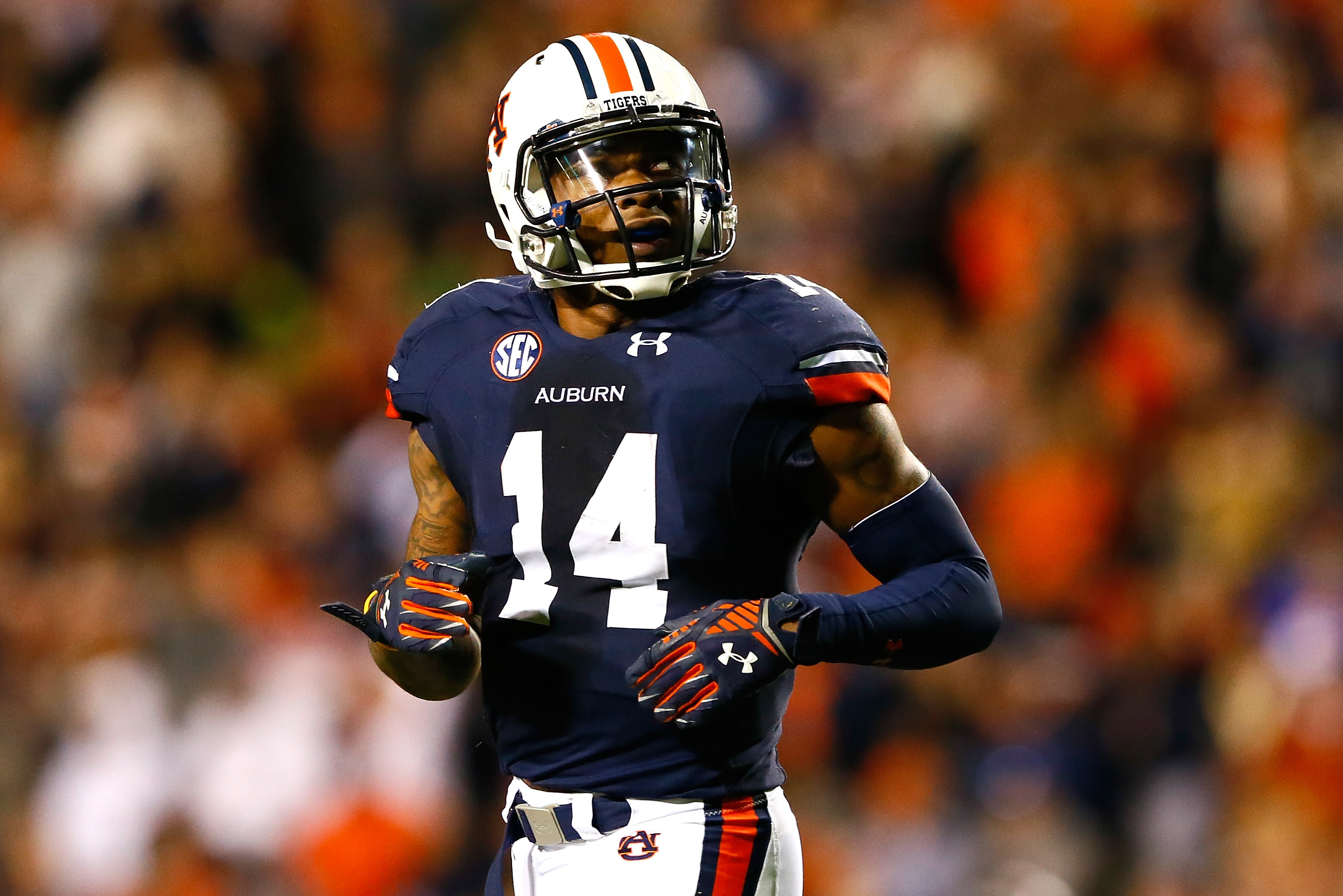 Auburn's Nick Marshall moving from quarterback to cornerback for