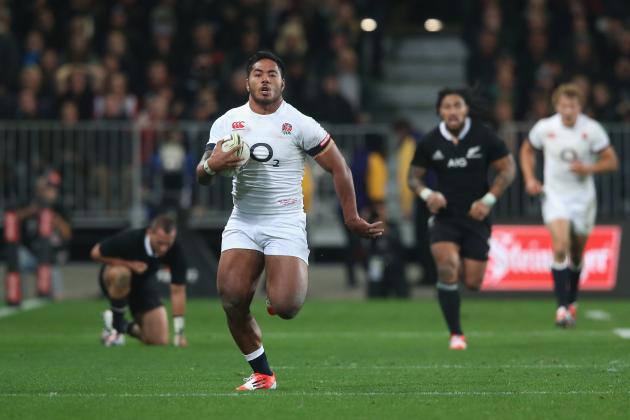 DUNEDIN, NEW ZEALAND - JUNE 14:  Manu Tuilagi of England breaks with the ball but is caught short of the try line by Ben Smith during the International Test Match between the New Zealand All Blacks and England at Forsyth Barr Stadium on June 14, 2014 in Dunedin, New Zealand.  (Photo by David Rogers/Getty Images)