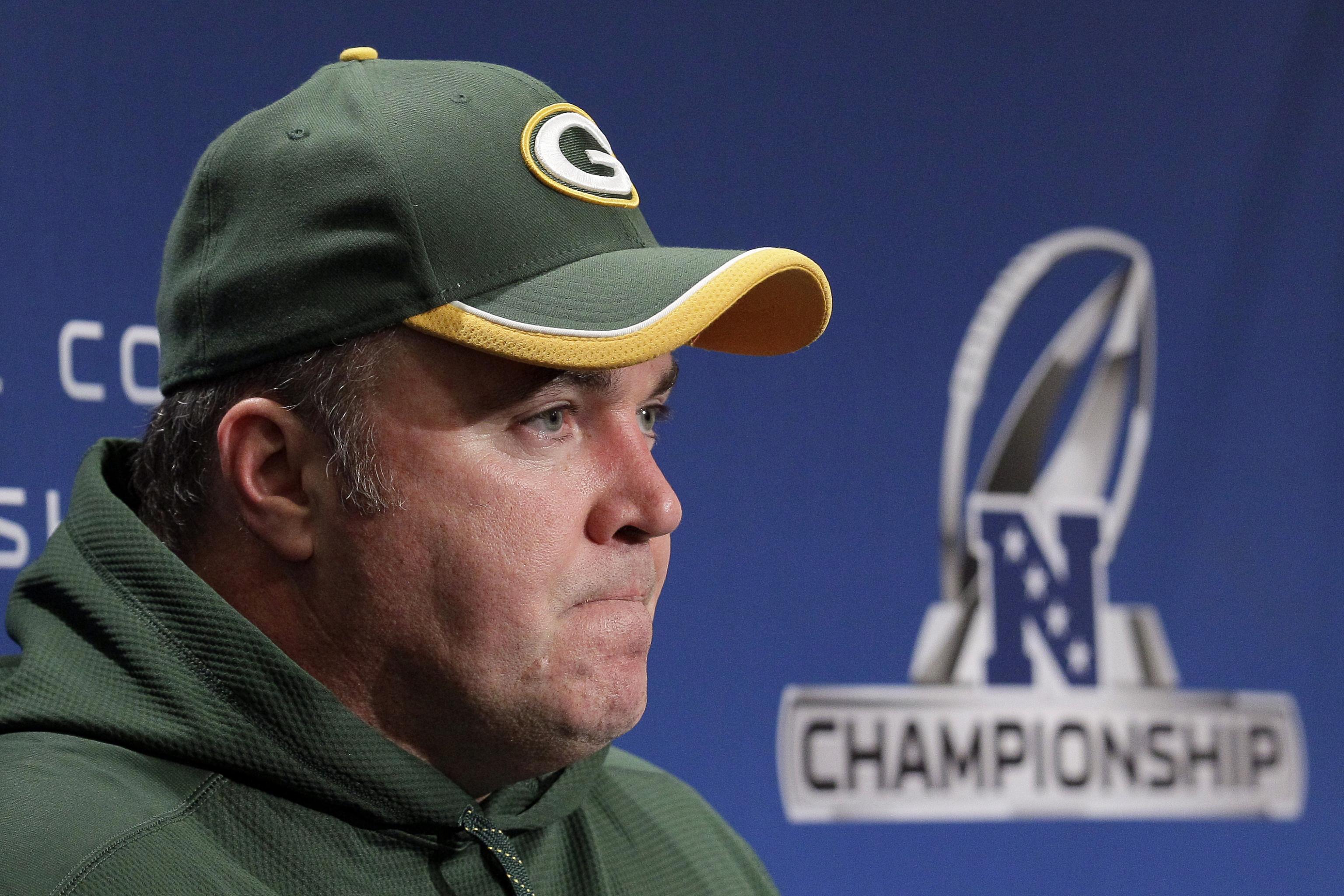 Green Bay Packers coach Mike McCarthy calls for an instant replay