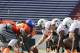 Senior Bowl players line to run through a drill during NCAA college football practice for the Senior Bowl, Tuesday, Jan. 20, 2015, at Ladd-Peebles Stadium in Mobile, Ala. (AP Photo/Brynn Anderson)