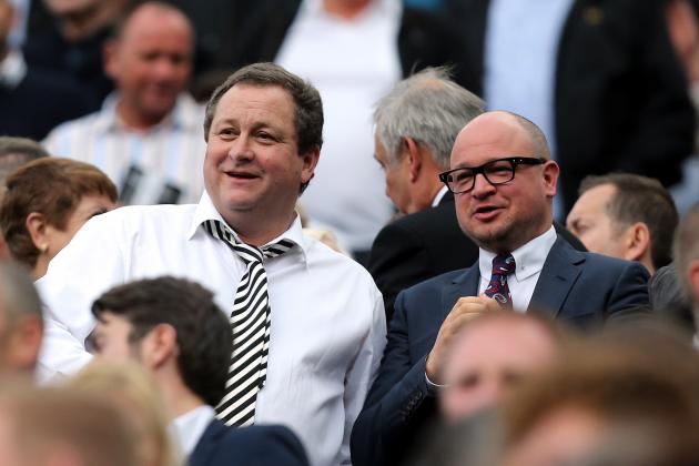 Newcastle United's owner Mike Ashley, left, and managing director Lee Charnley, right, are seen in the stand ahead of their English Premier League soccer match between Newcastle United and Manchester City at St James' Park, Newcastle, England, Sunday, Aug. 17, 2014. (AP Photo/Scott Heppell)