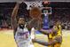 Los Angeles Clippers center DeAndre Jordan, left, dunks the ball as Cleveland Cavaliers center Tristan Thompson defends during the second half of an NBA basketball game, Friday, Jan. 16, 2015, in Los Angeles. The Cavaliers won 126-121. (AP Photo/Mark J. Terrill)