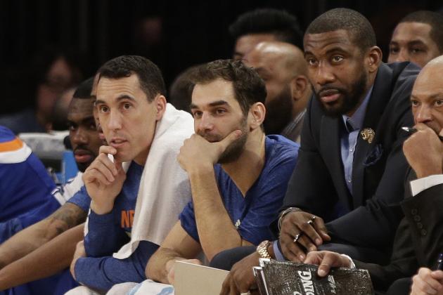 New York Knicks' Amar'e Stoudemire, right, Jose Calderon, center, and Pablo Prigioni, left, watch during the second half of an NBA basketball game against the Charlotte Hornets, Saturday, Jan. 10, 2015, in New York. The Hornets won the game 110-82. (AP Photo/Frank Franklin II)