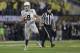 Oregon quarterback Marcus Mariota (8) looks to throw during the first half of the NCAA college football playoff championship game against Ohio State Monday, Jan. 12, 2015, in Arlington, Texas. (AP Photo/Eric Gay)