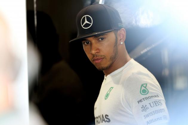 SUZUKA, JAPAN - OCTOBER 03:  Lewis Hamilton of Great Britain and Mercedes GP looks on from the team garage during practice for the Japanese Formula One Grand Prix at Suzuka Circuit on October 3, 2014 in Suzuka, Japan.  (Photo by Clive Mason/Getty Images)