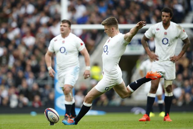 England’s Owen Farrell kicks a penalty goal during their international rugby union match against New Zealand at Twickenham stadium, London, Saturday, Nov. 8, 2014. (AP Photo/Alastair Grant)