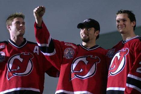 Members of the 1994-95 New Jersey Devils team pose for a group