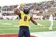 MEMPHIS, TN - DECEMBER 29: Kevin White #11 of the West Virginia Mountaineers reacts to a touchdown against the Texas A&M Aggies during the second quarterof the 56th annual Autozone Liberty Bowl at Liberty Bowl Memorial Stadium on December 29, 2014 in Memphis, Tennessee. (Photo by Stacy Revere/Getty Images)