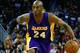 FILE - In this Wednesday, Jan. 21, 2015, file photo, Los Angeles Lakers guard Kobe Bryant (24) drives with the ball during the first half of an NBA basketball game in New Orleans. The team announced Bryant's surgery Monday, Jan. 26, 2015, to repair his torn rotator cuff. The surgery has been scheduled for Wednesday morning. A timeline estimate for Bryant’s return will be issued following the surgery. (AP Photo/Jonathan Bachman, File)