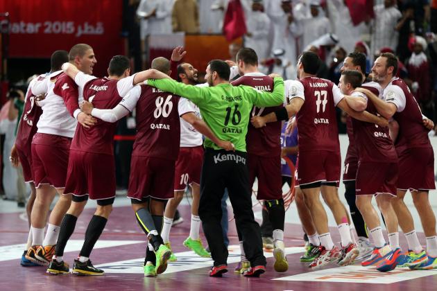 Players from Qatar celebrate their win following the 24th Men's Handball World Championships semifinals match between Poland and Qatar at the Lusail Multipurpose Hall, in Doha, Qatar, Friday, Jan. 30, 2015. (AP Photo/Osama Faisal
