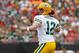 Dec 21, 2014; Tampa, FL, USA; Green Bay Packers quarterback Aaron Rodgers (12) throws the ball against the Tampa Bay Buccaneers during the first half at Raymond James Stadium. Mandatory Credit: Kim Klement-USA TODAY Sports
