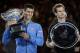 Novak Djokovic of Serbia, left, holds the trophy with runner-up Andy Murray of Britain during the trophy presentation after winning the men's singles final at the Australian Open tennis championship in Melbourne, Australia, Sunday, Feb. 1, 2015. (AP Photo/Bernat Armangue)