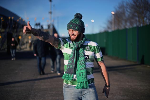 GLASGOW, SCOTLAND - FEBRUARY 01:  A Celtic fan leaves Hampden Park following their 2-0 win in the League Cup semi final match against Rangers on February 1, 2105 in Glasgow, Scotland. One of world football's most intense rivalries Rangers and Celtic met today for the first time in three years.  (Photo by Jeff J Mitchell/Getty Images)