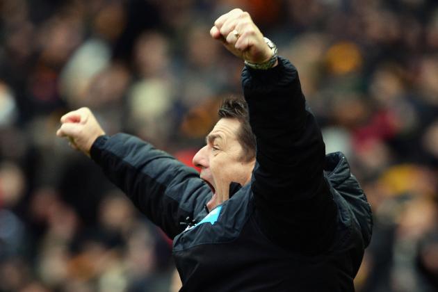 HULL, ENGLAND - JANUARY 31:  John Carver, manager of Newcastle United celebrates his team's third goal during the Barclays Premier League match between Hull City and Newcastle United at KC Stadium on January 31, 2015 in Hull, England.  (Photo by Nigel Roddis/Getty Images)