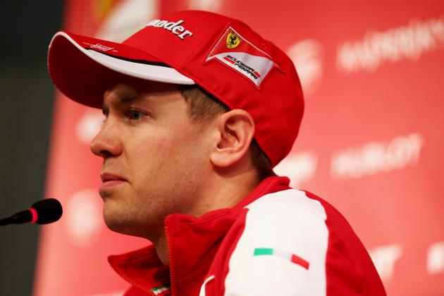 JEREZ DE LA FRONTERA, SPAIN - FEBRUARY 01:  Sebastian Vettel of Germany and Ferrari speaks with members of the media at a press conference during day one of Formula One Winter Testing at Circuito de Jerez on February 1, 2015 in Jerez de la Frontera, Spain.  (Photo by Mark Thompson/Getty Images)